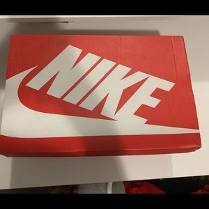 Nike Air More Uptempo, size 10/5, and never worn in Great Condition